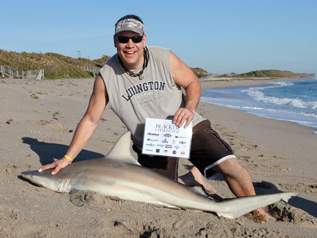 Kevin Raes with a blacktip shark caught in the 2015 Blacktip Challenge