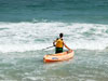 Josh Jorgensen preparing to kayak out a shark bait during the 2011 Blacktip Challenge shark fishing tournament in Florida