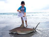 Nico Salomoni with a blacktip shark during the 2011 Blacktip Challenge shark fishing tournament in Florida